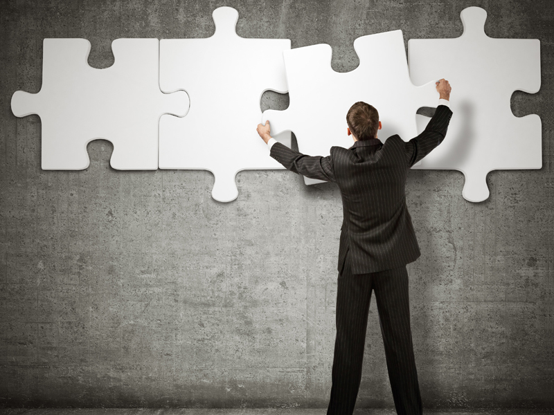 Man with puzzle piece